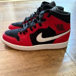 Nike Men’s Air Jordan Black and Red High-Top Sneakers